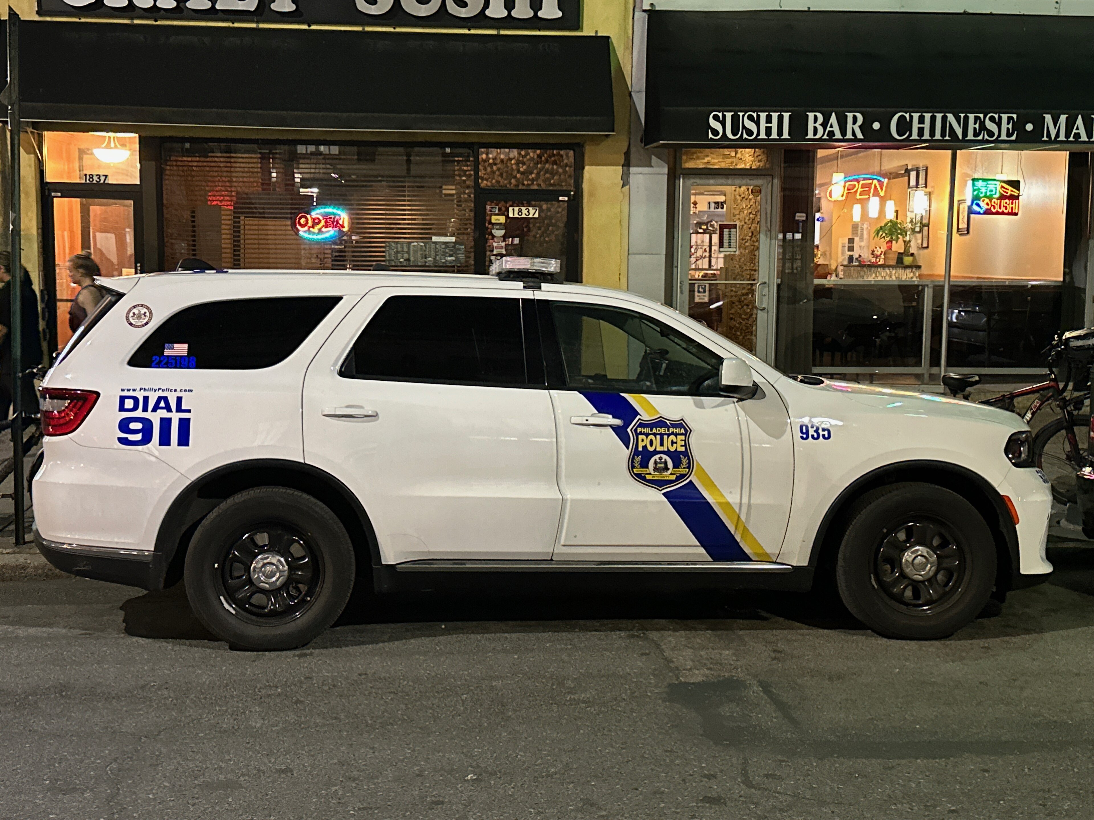 A Philadelphia Police Department patrol car parked on a city street