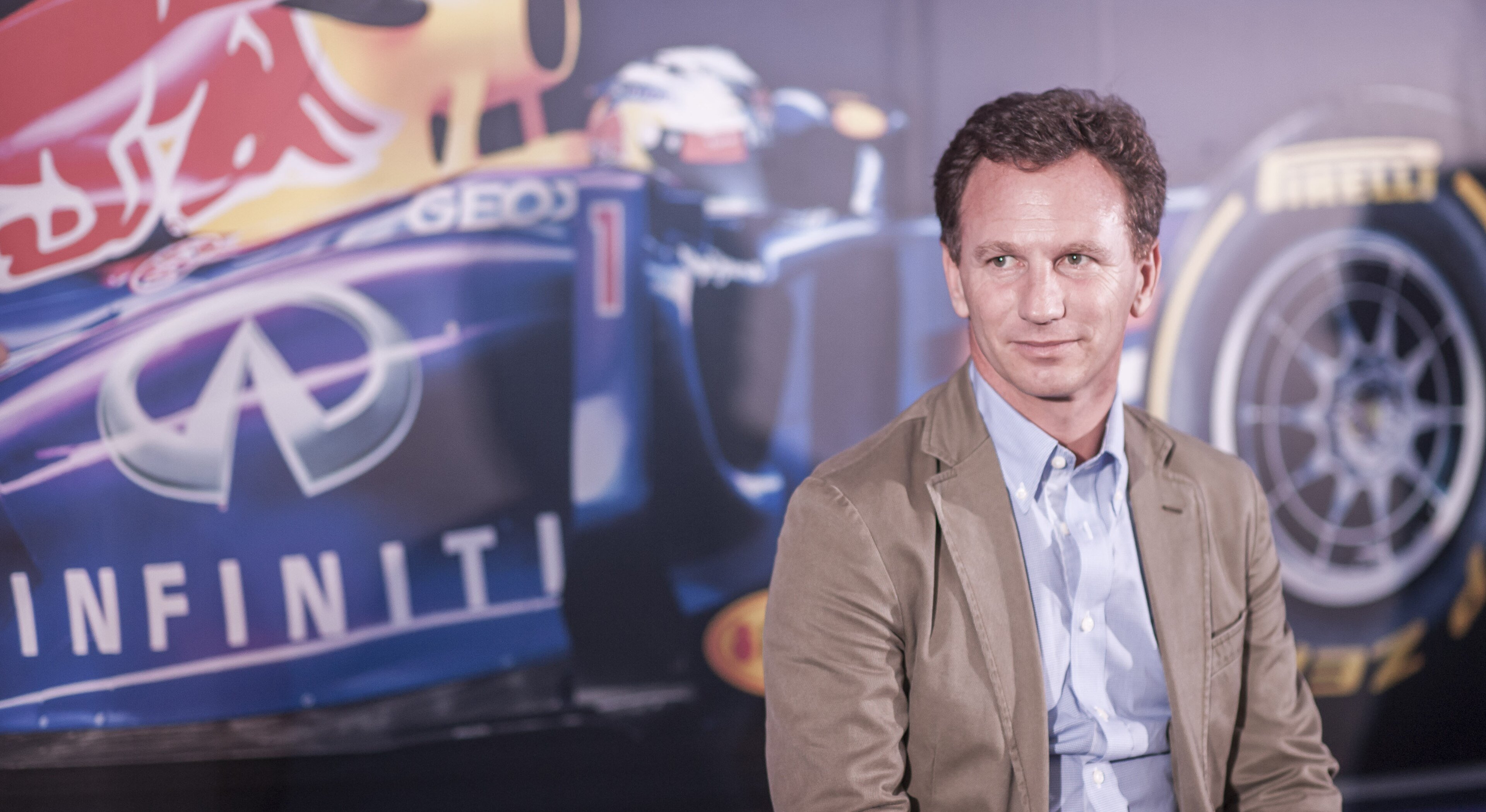 Christian Horner speaking on stage at the British Embassy in Tokyo