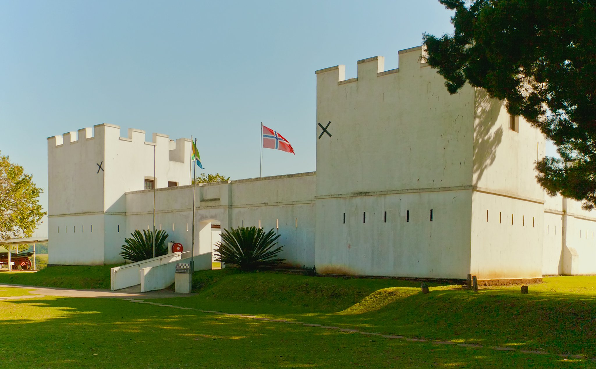 Fort Nonquai, a white historic building with a tower, in Eshowe