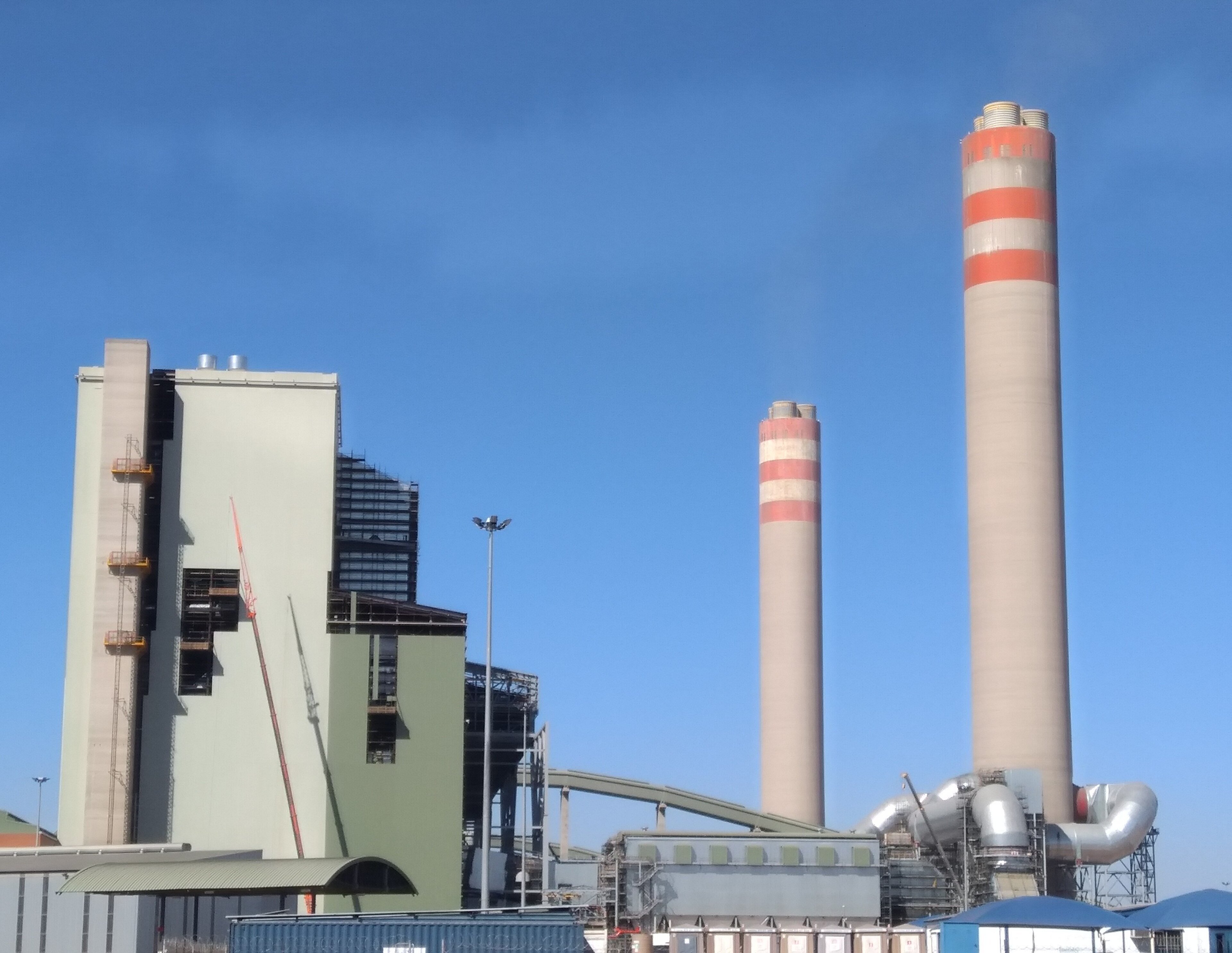 Northern view of the Medupi power station in Limpopo with its tall cooling towers and chimney