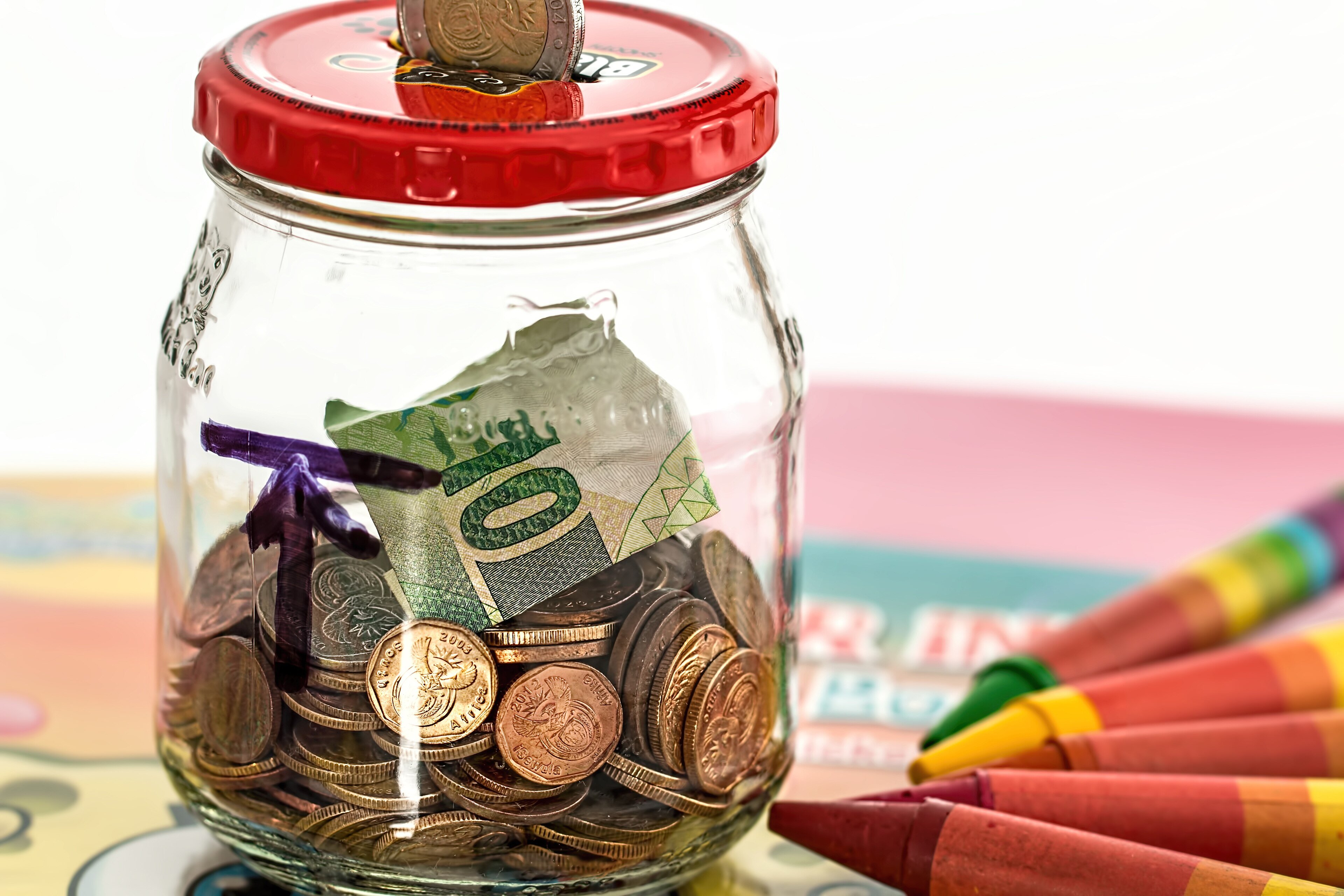 A piggy bank sitting on a table, representing an ordinary savings account