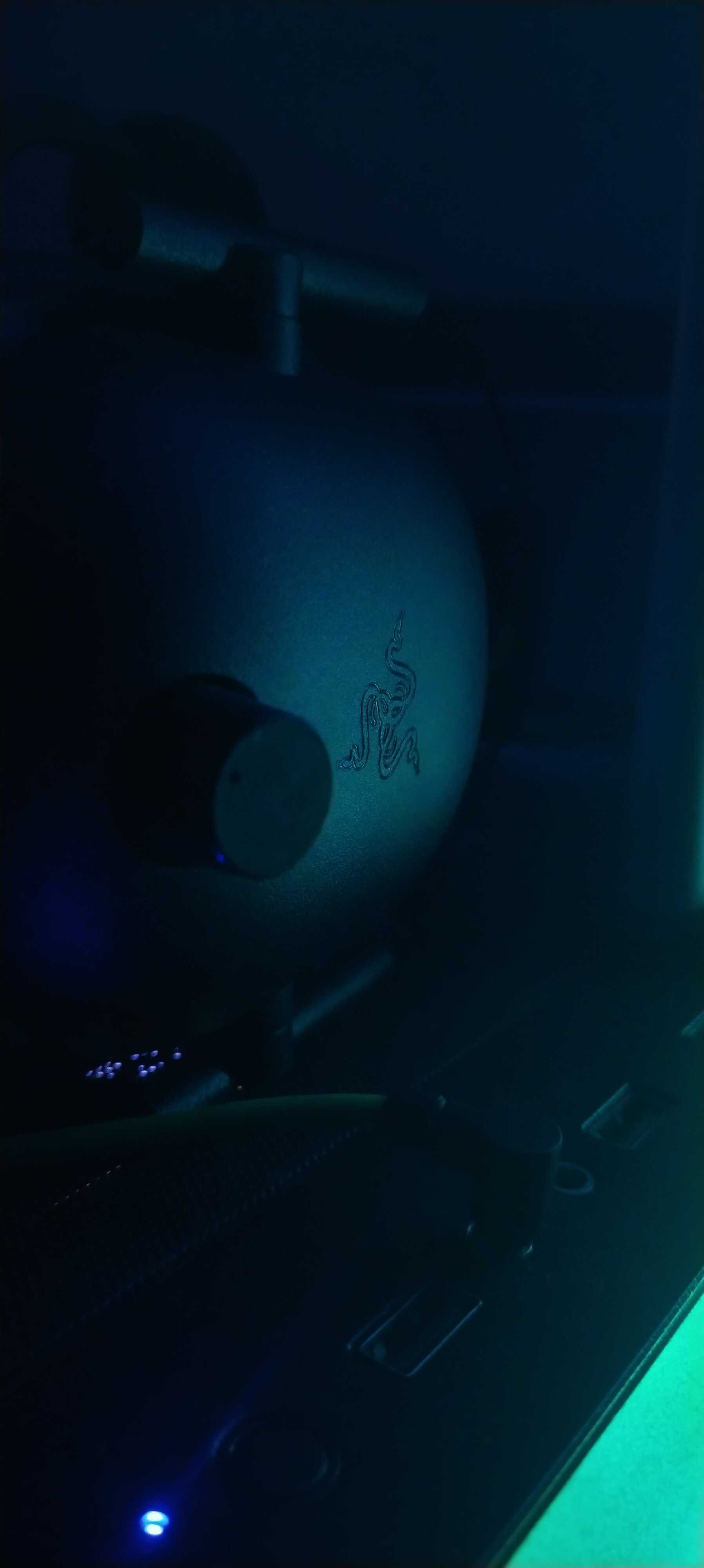 A gaming headset with a microphone on a desk
