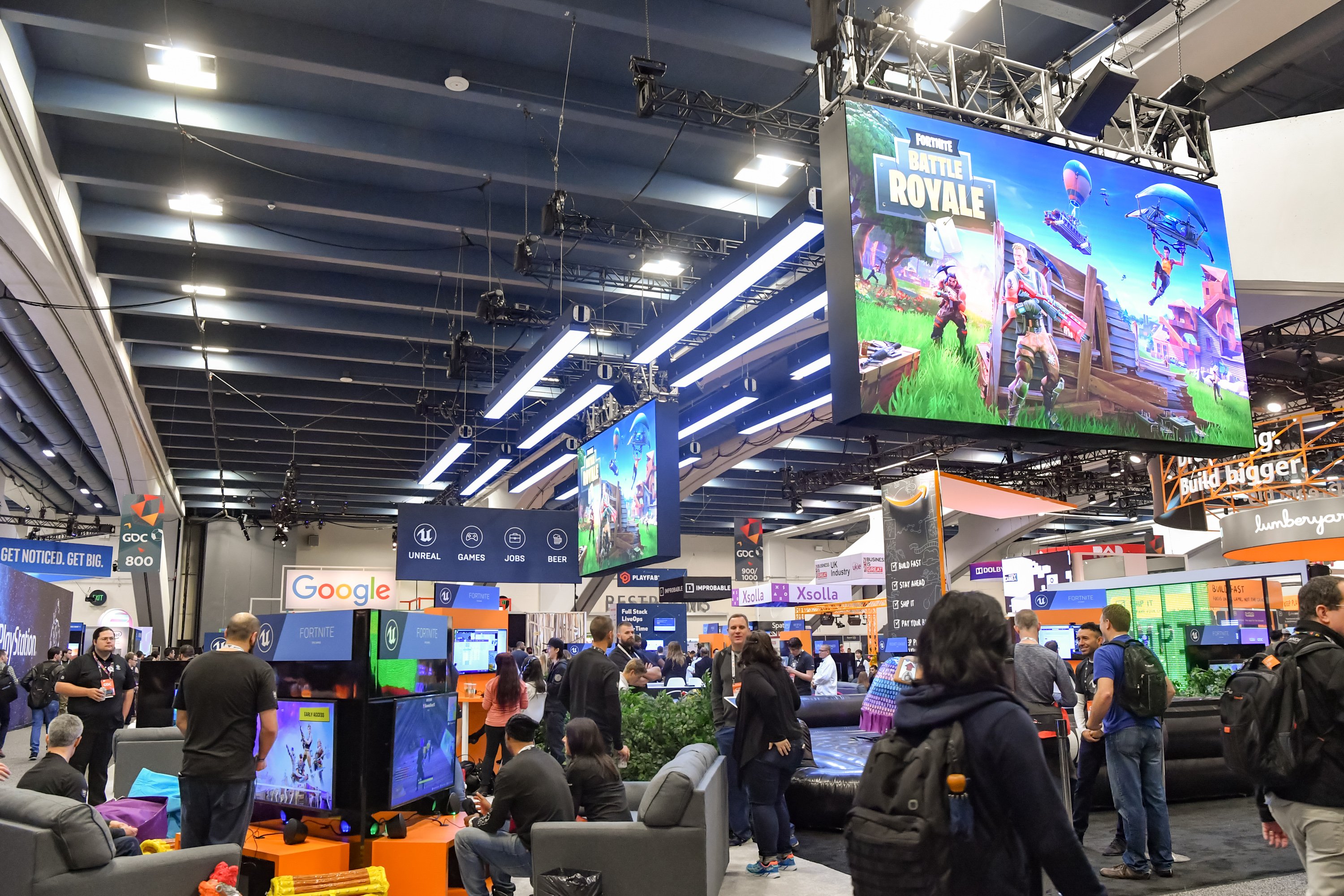 Fortnite Battle Royale shown on a big screen at a games conference