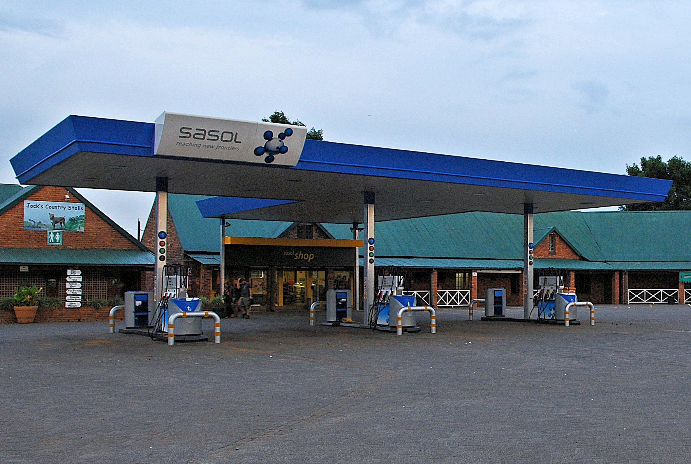 A Sasol petrol station forecourt with fuel pumps