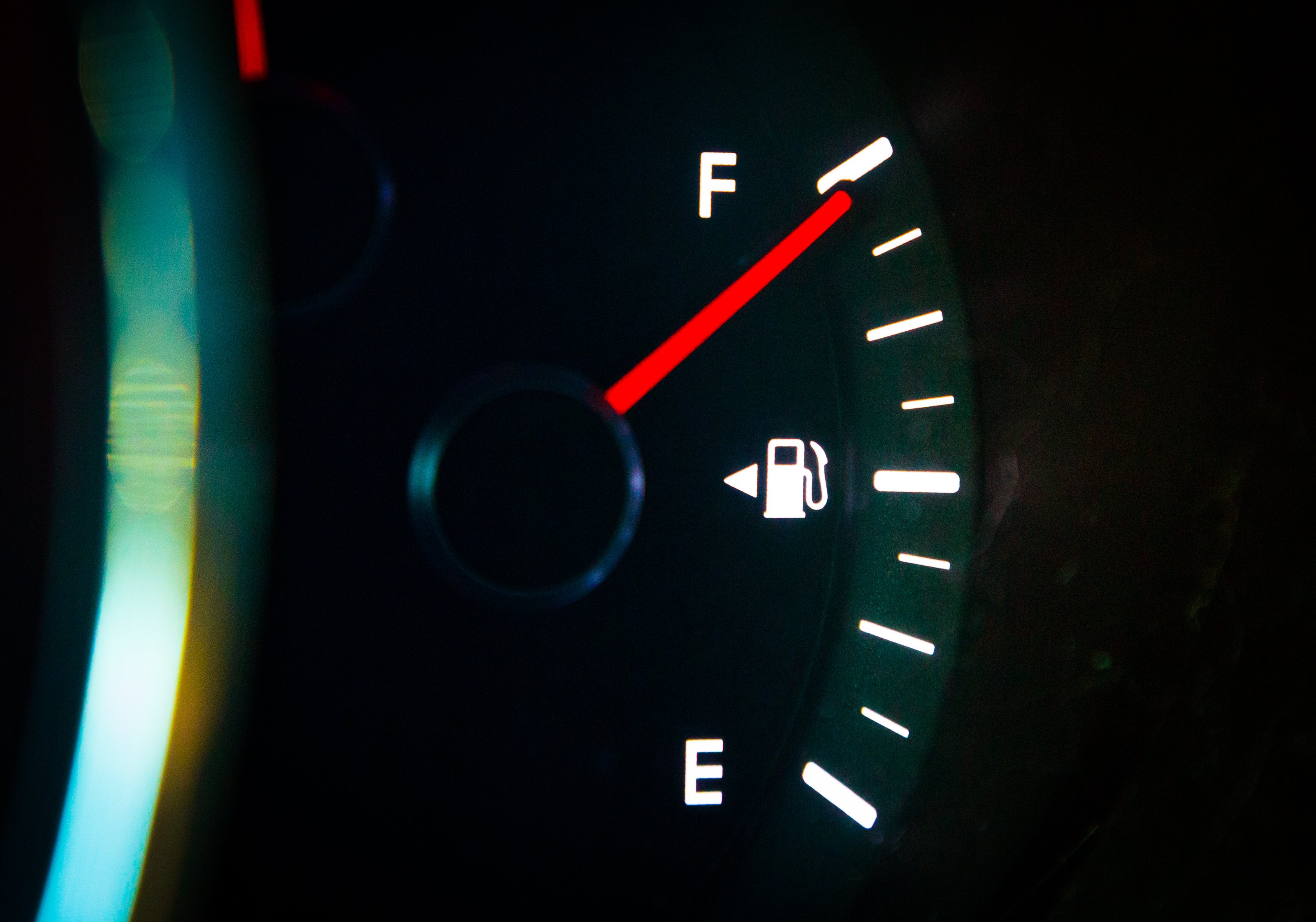 A car fuel gauge showing a full tank