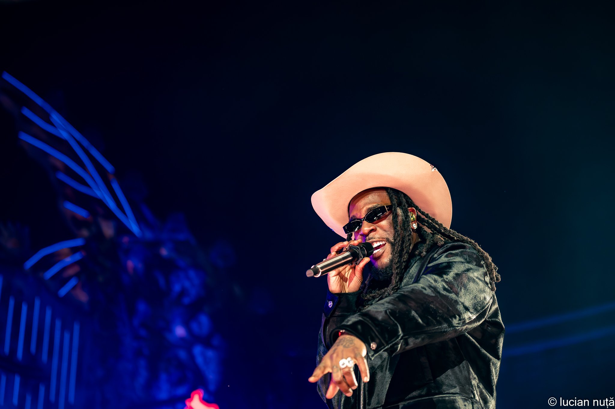 Burna Boy performing on stage at the Untold festival in 2024