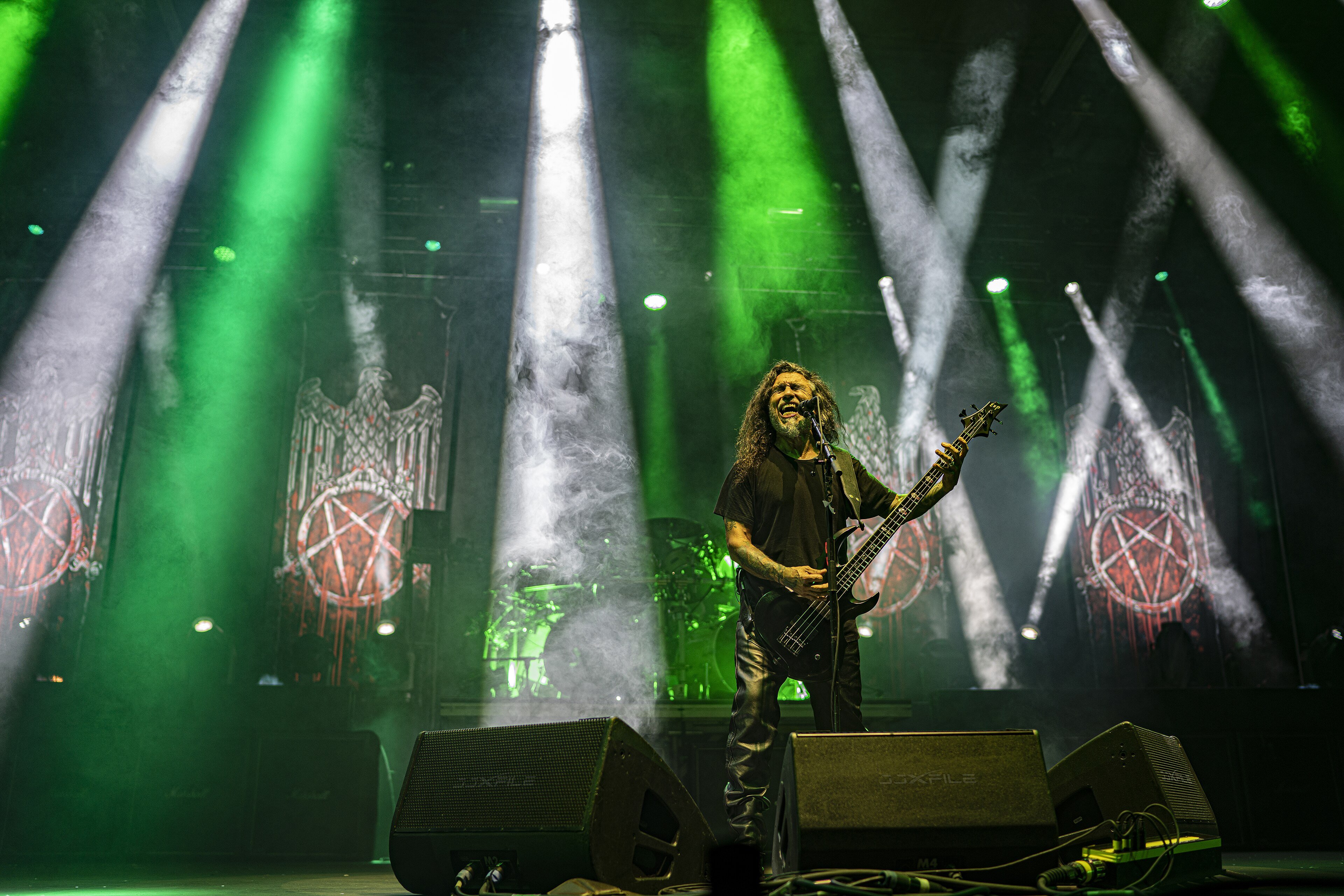 Tom Araya of Slayer singing on stage at Riot Fest in 2019