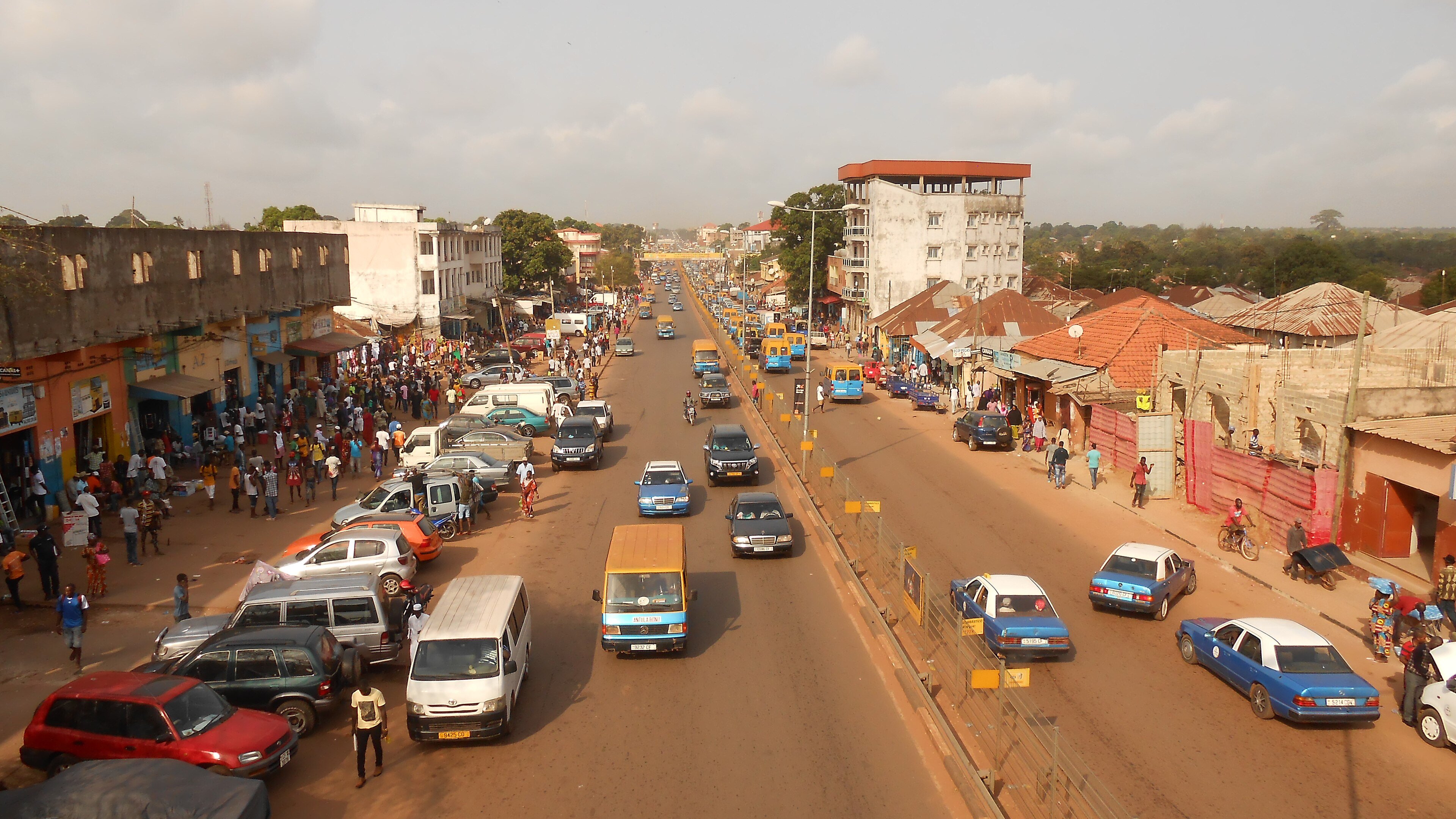The central avenue in Bissau, Guinea-Bissau, with the Bandim market in view