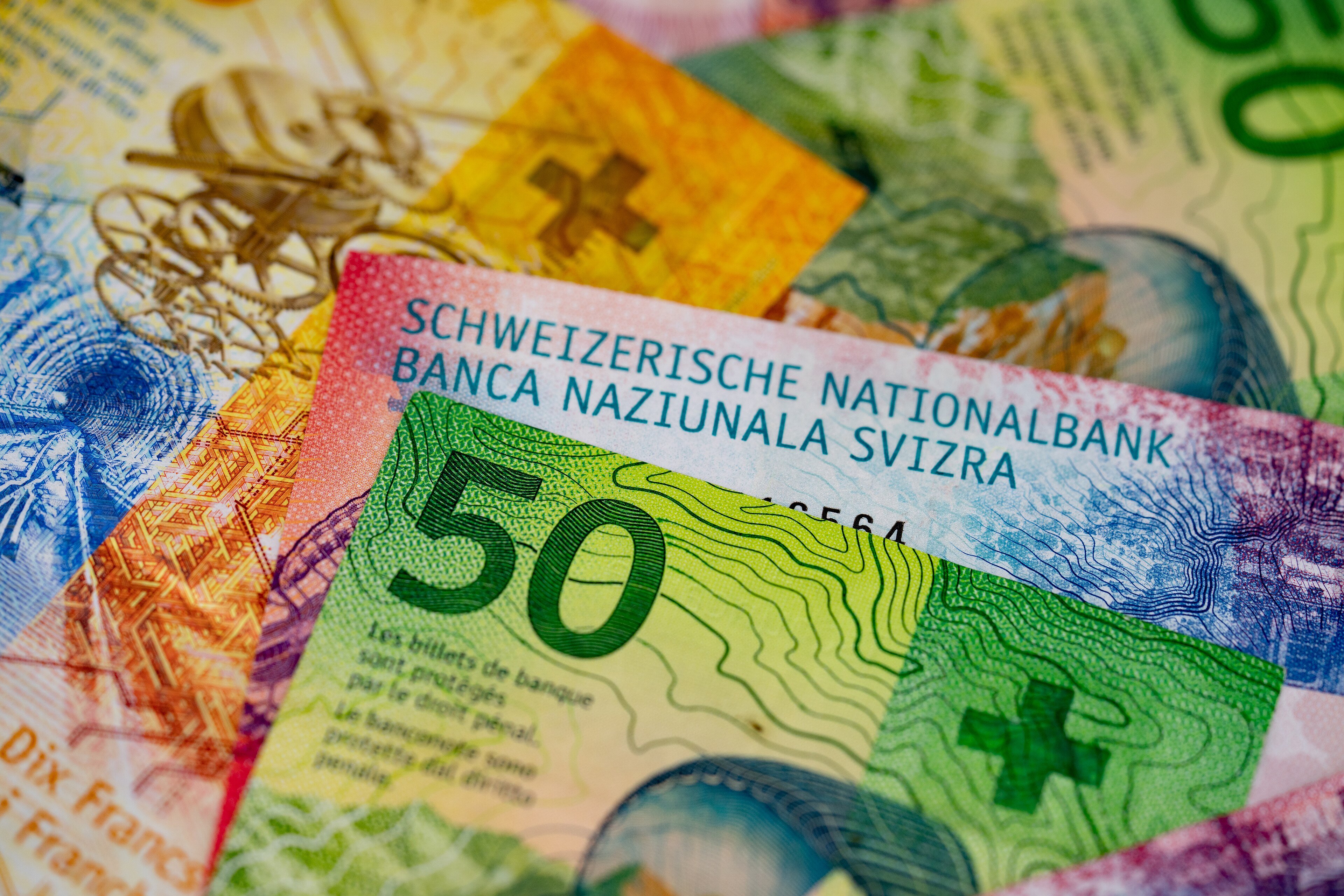 Swiss franc banknotes, Switzerland still runs the OECD's highest-earning wealth tax