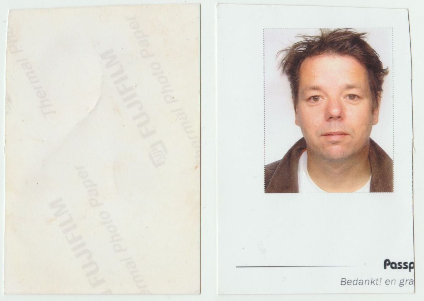 A strip of passport-style photos from a photo booth