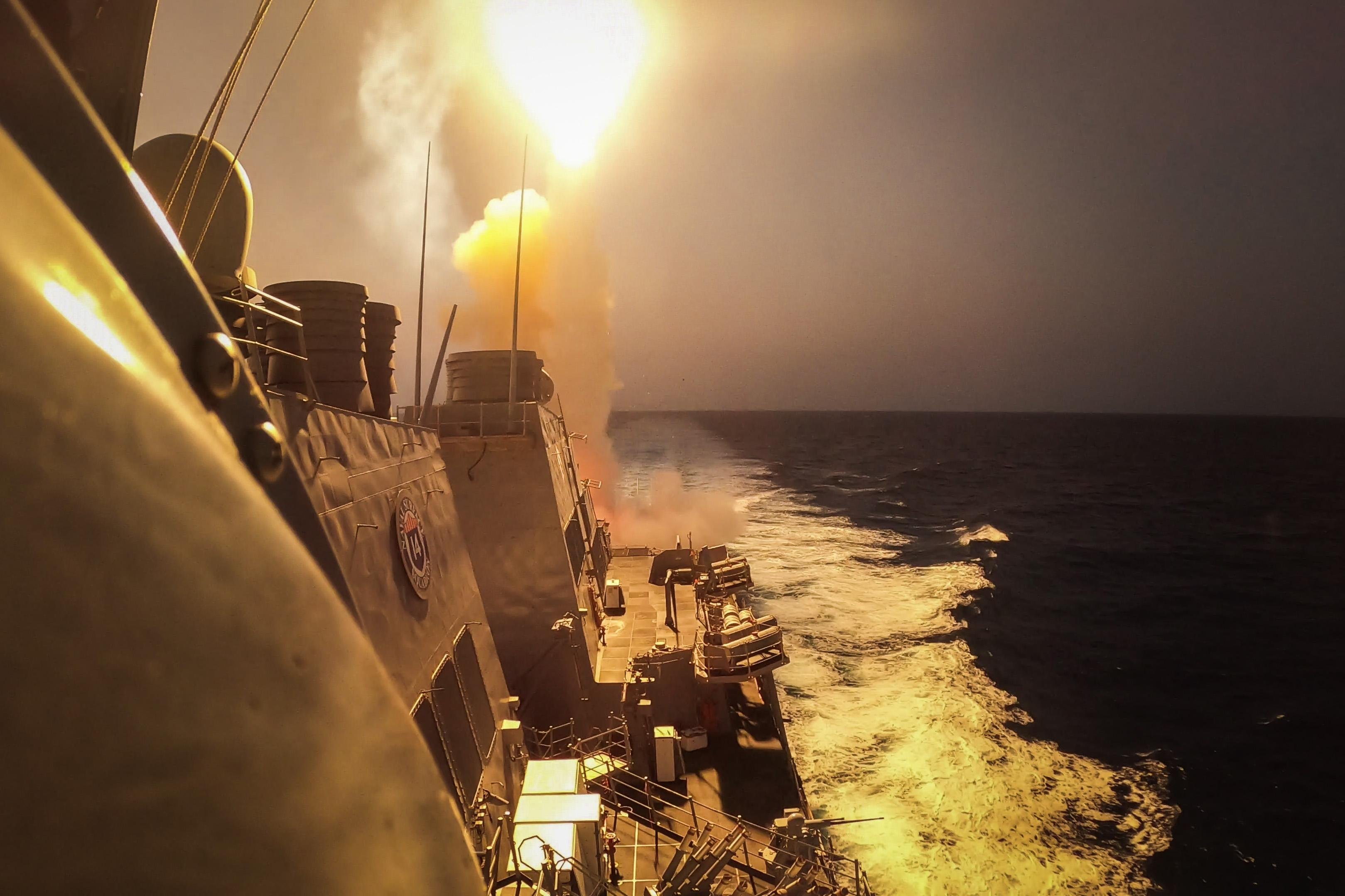 A US Navy destroyer fires at Houthi missiles over the Red Sea