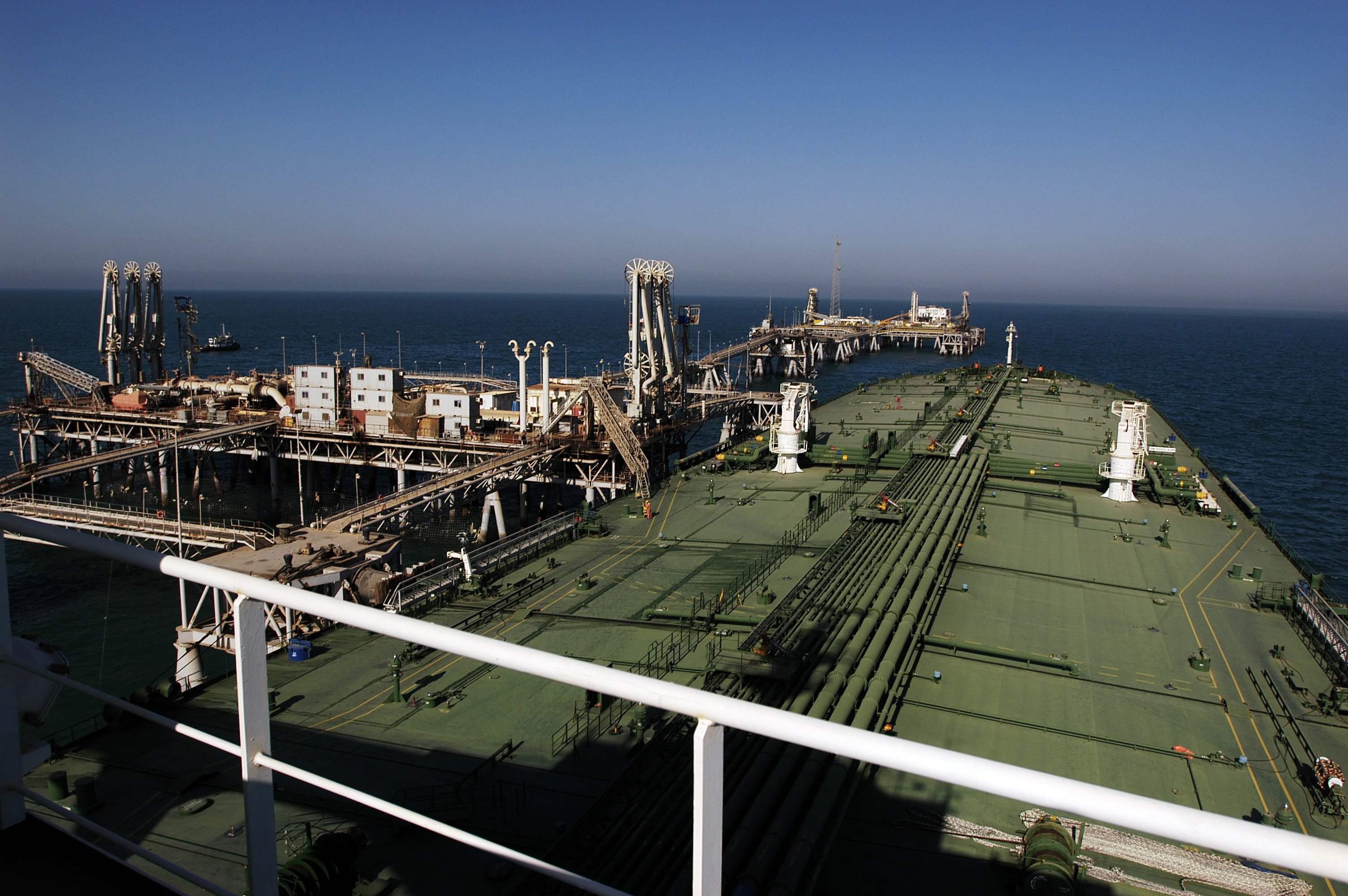 An oil tanker loading crude at an offshore terminal in the Persian Gulf