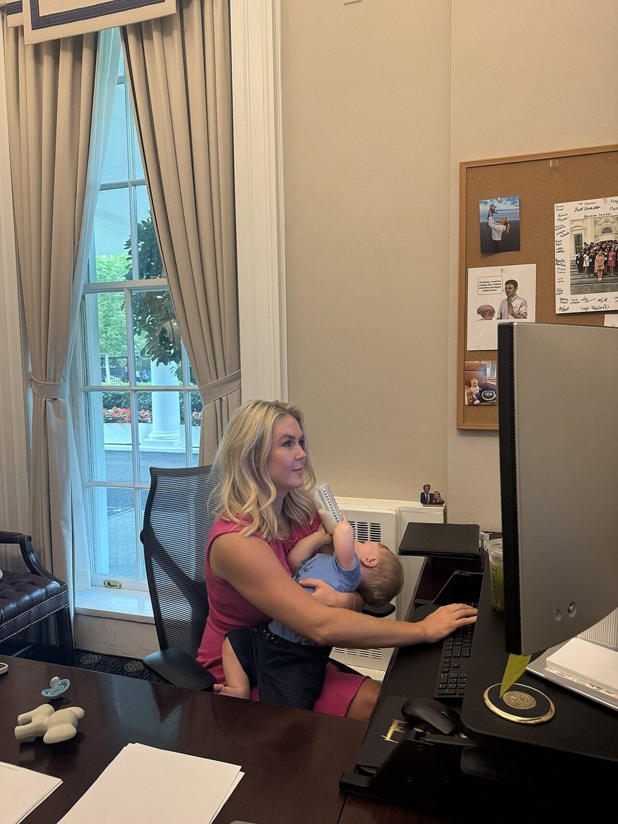 Karoline Leavitt feeding her baby while working at her desk in the White House
