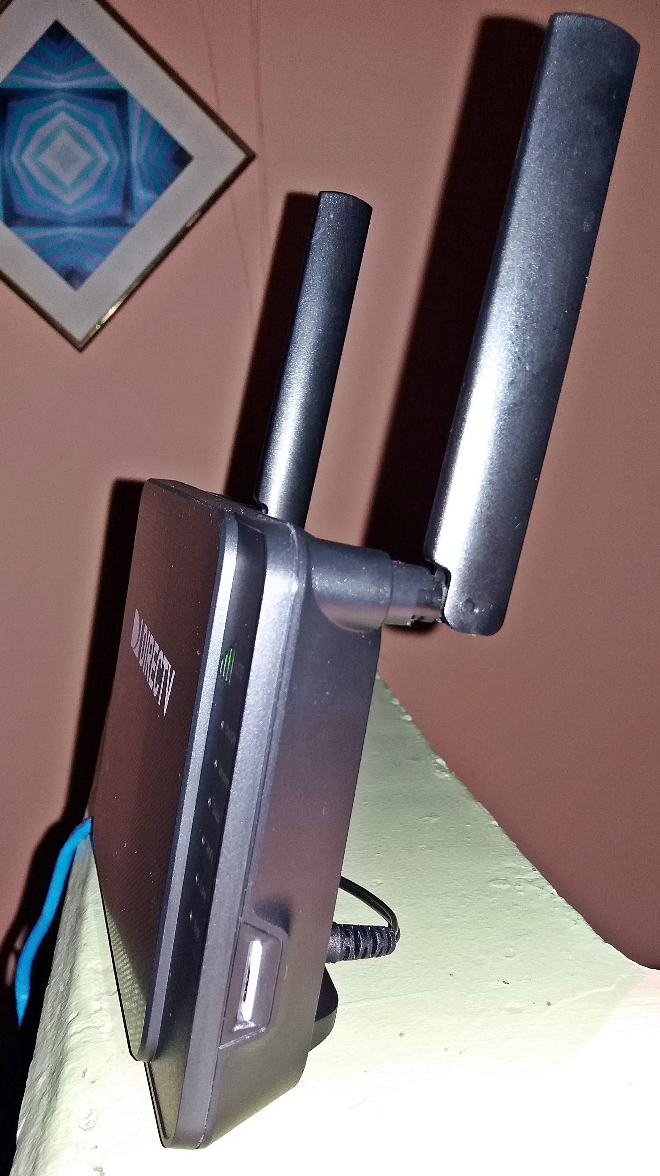 A 4G modem with its SIM card tray pulled out