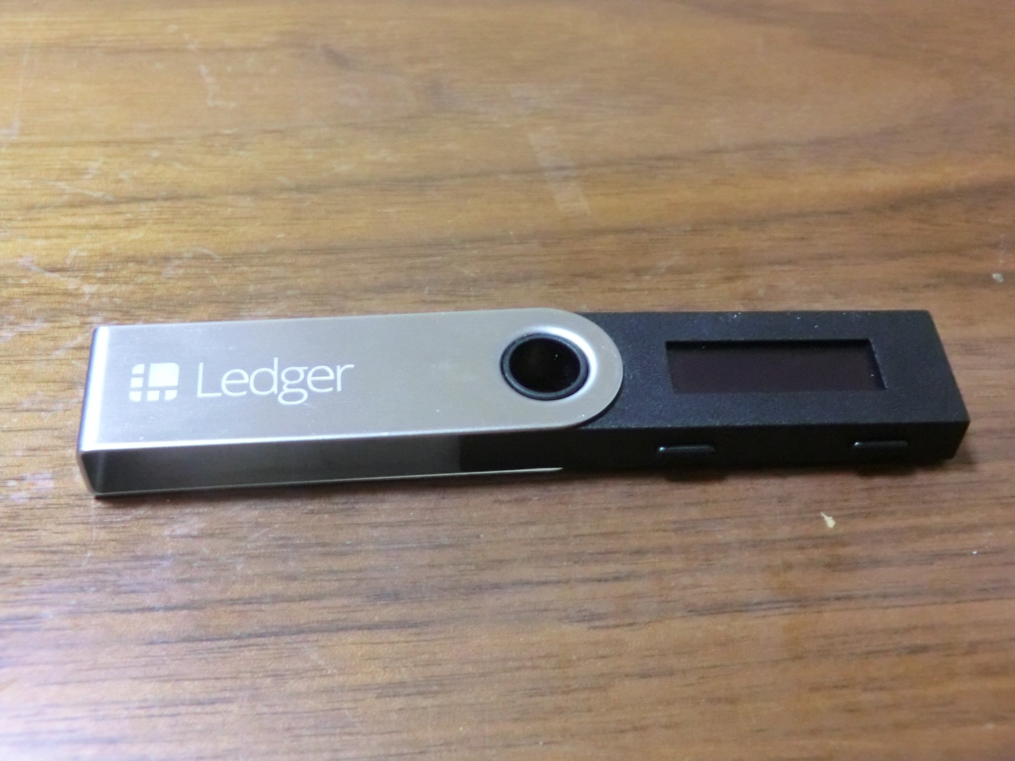 A Ledger Nano S hardware wallet, a small USB device used to store crypto keys offline