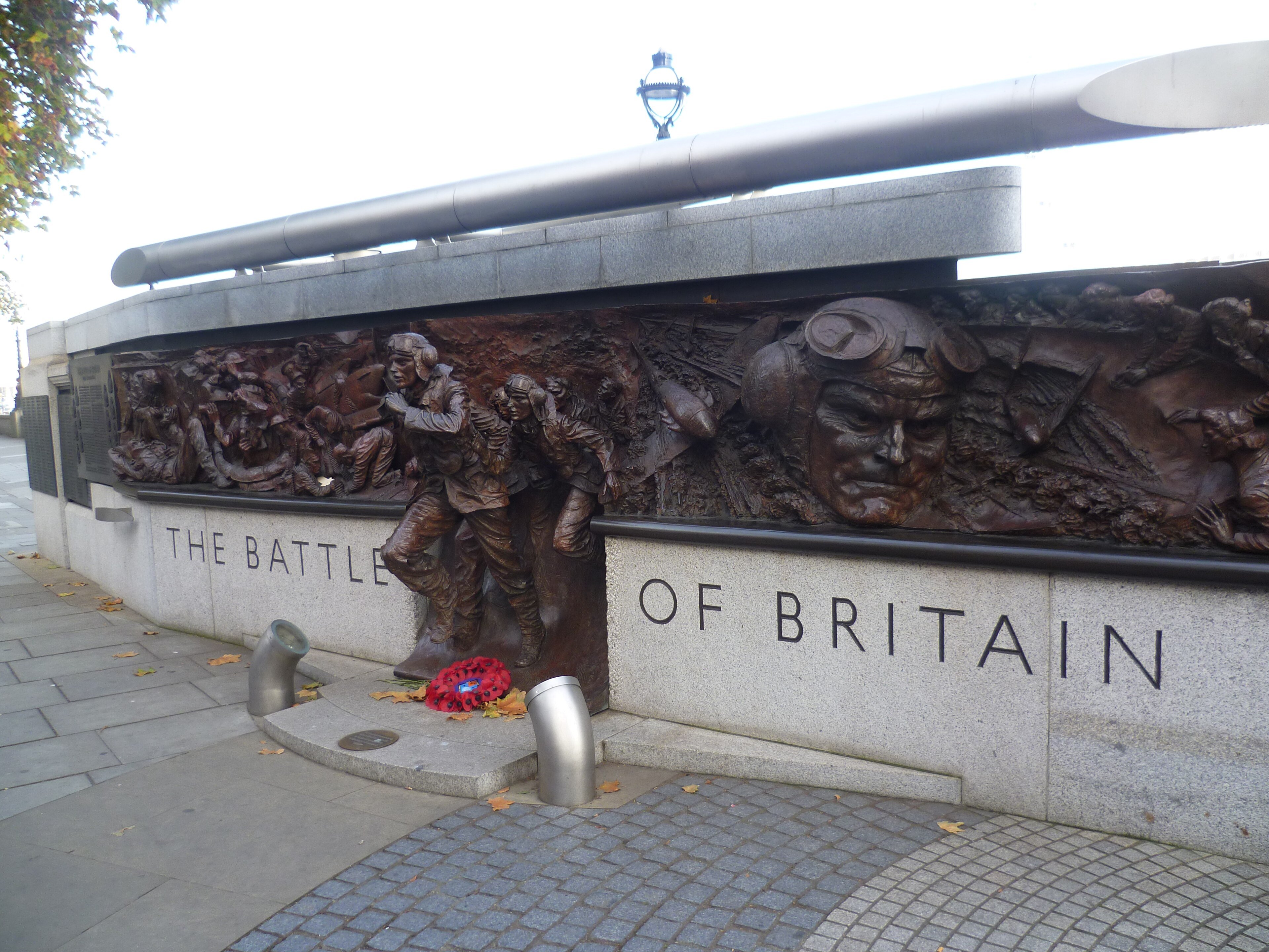 Bronze figures and names on the Battle of Britain Monument