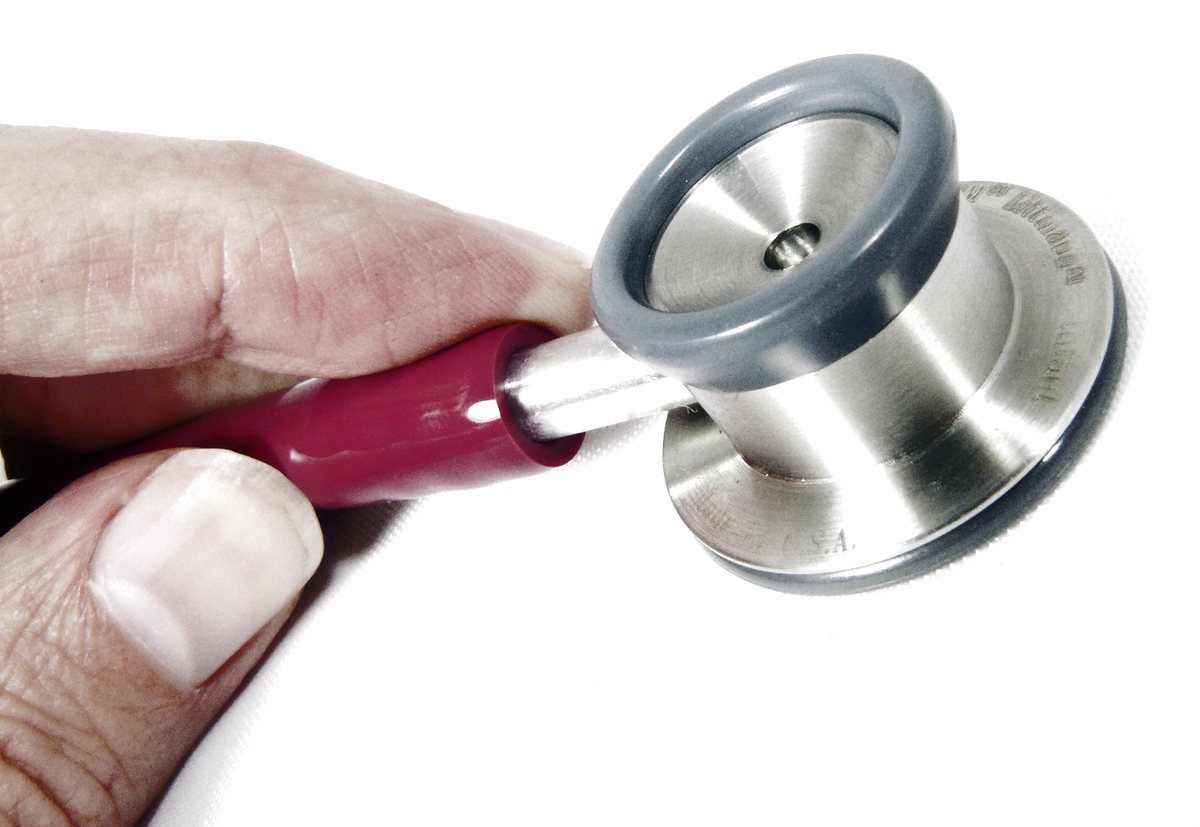 A doctor holding a stethoscope