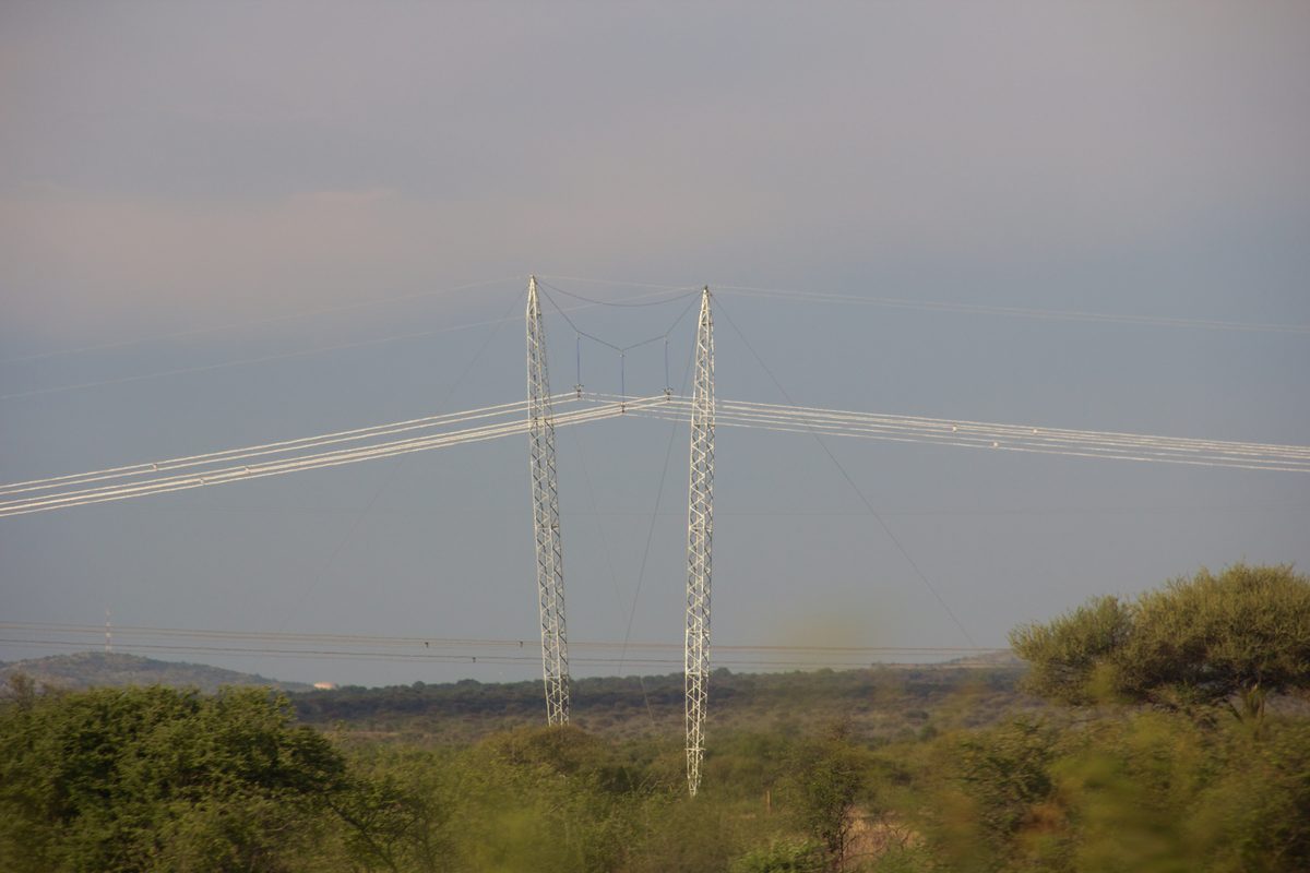 Power lines crossing open veld in South Africa