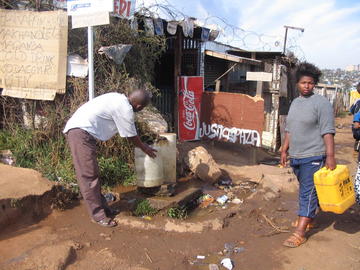A communal water tap on a pole in Soweto, Johannesburg