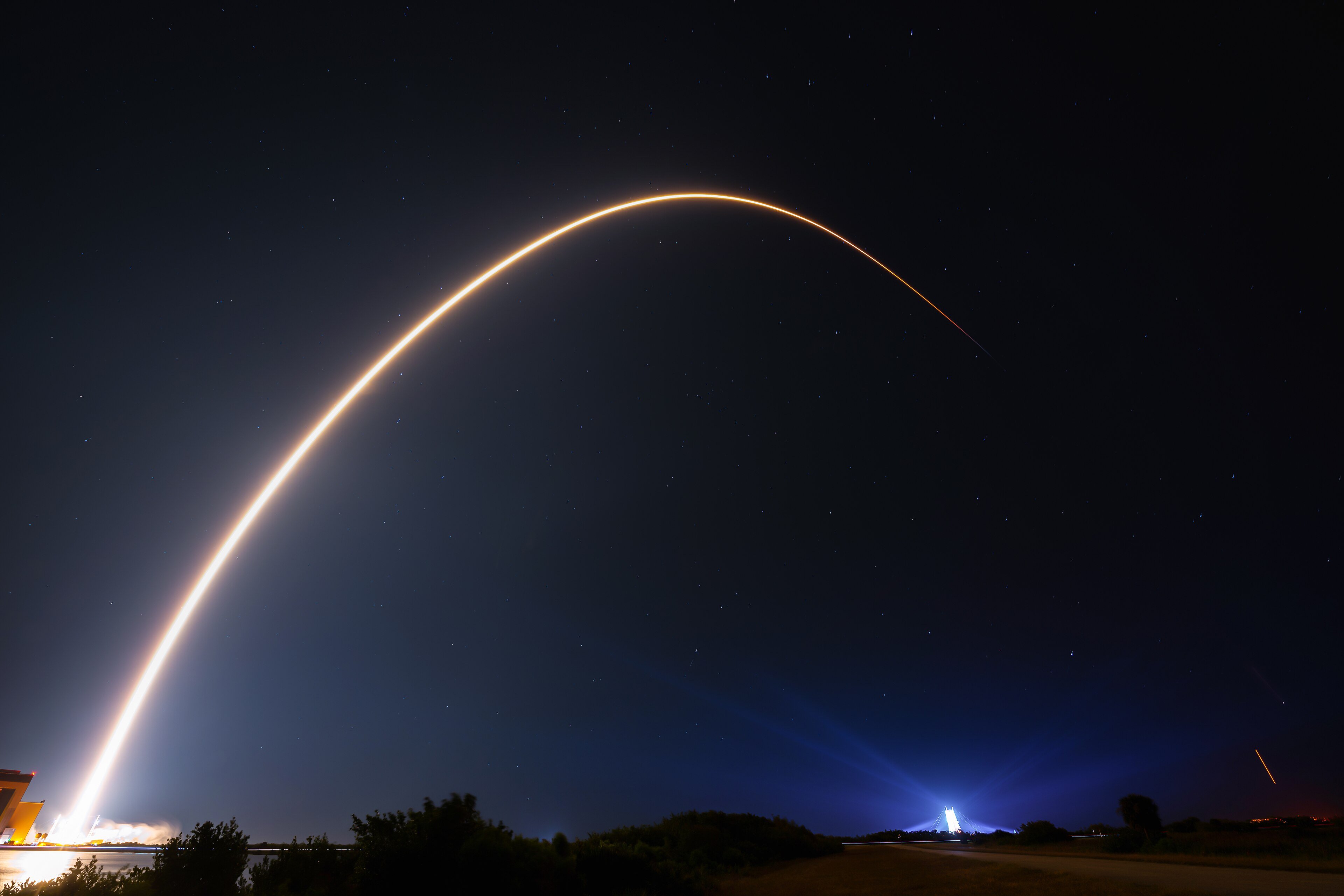 A Falcon 9 rocket lifts off carrying Starlink satellites