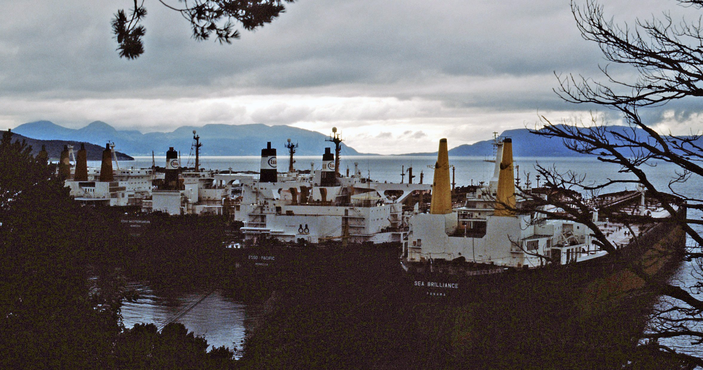 Two large oil tankers moored side by side
