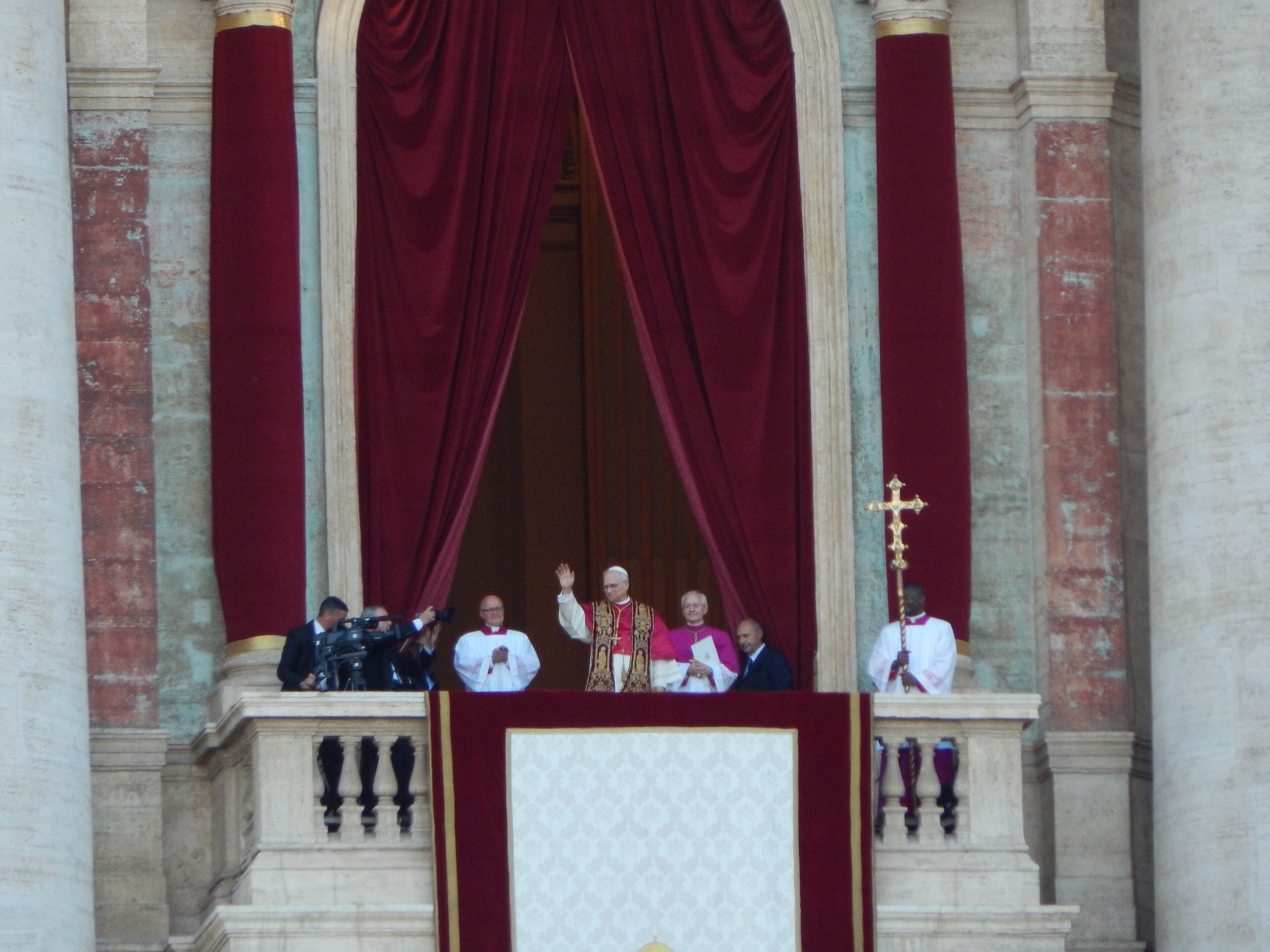 Pope Leo XIV waving to the crowd in St Peter's Square