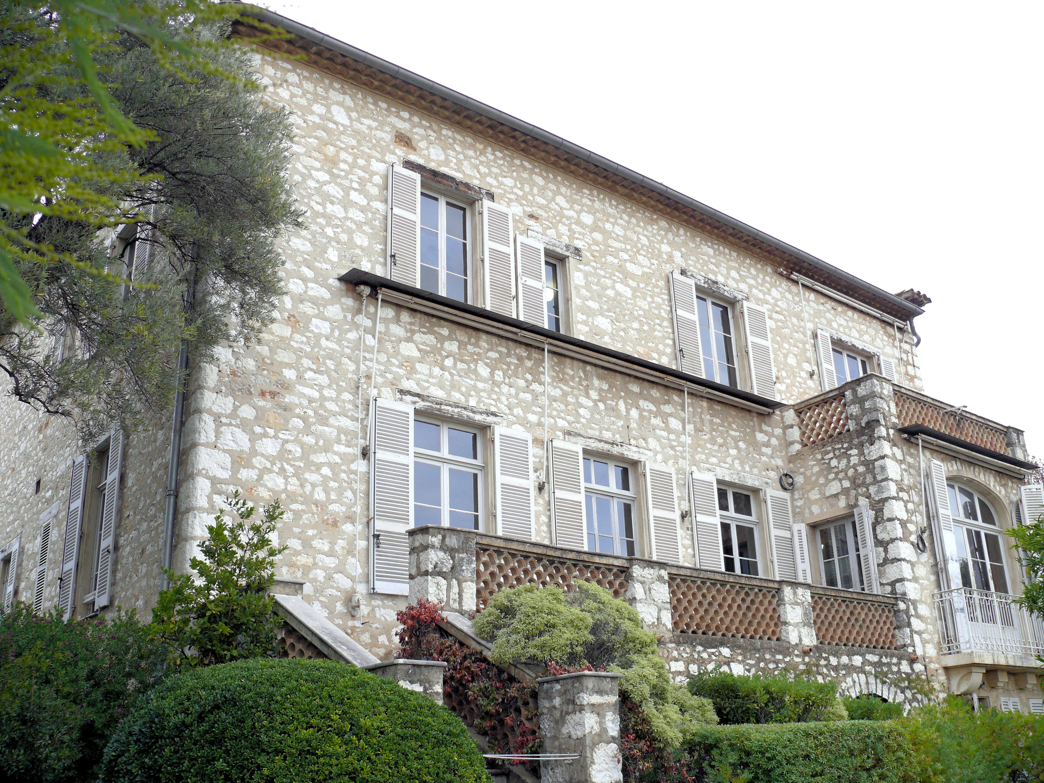The Renoir Museum house at Cagnes-sur-Mer, a pale building among trees