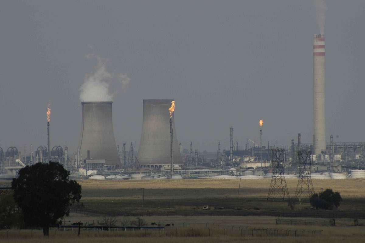 The Sasol synthetic fuel plant at Secunda, Mpumalanga, with cooling towers and gas flares