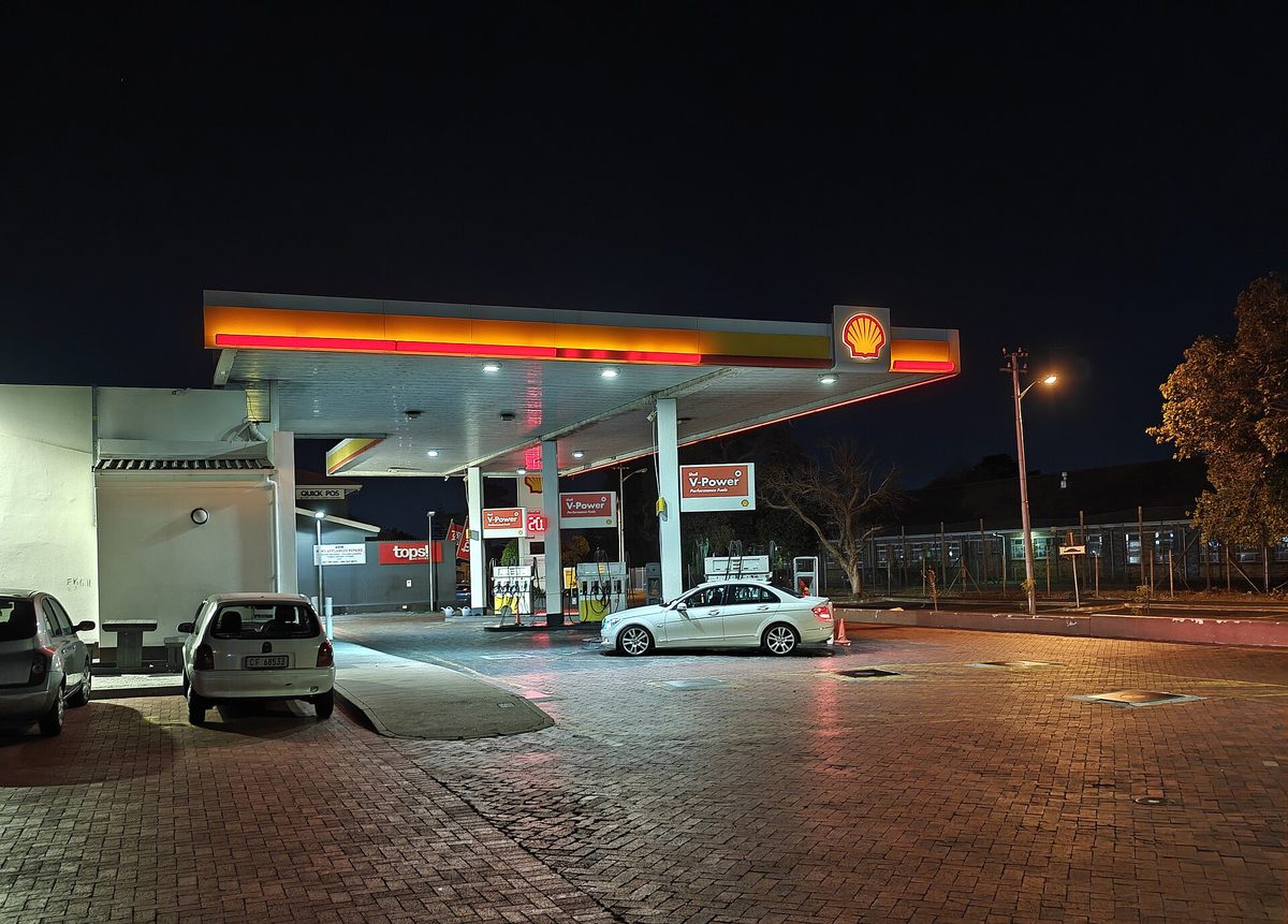A Shell petrol station in Plumstead, Cape Town, lit up at night
