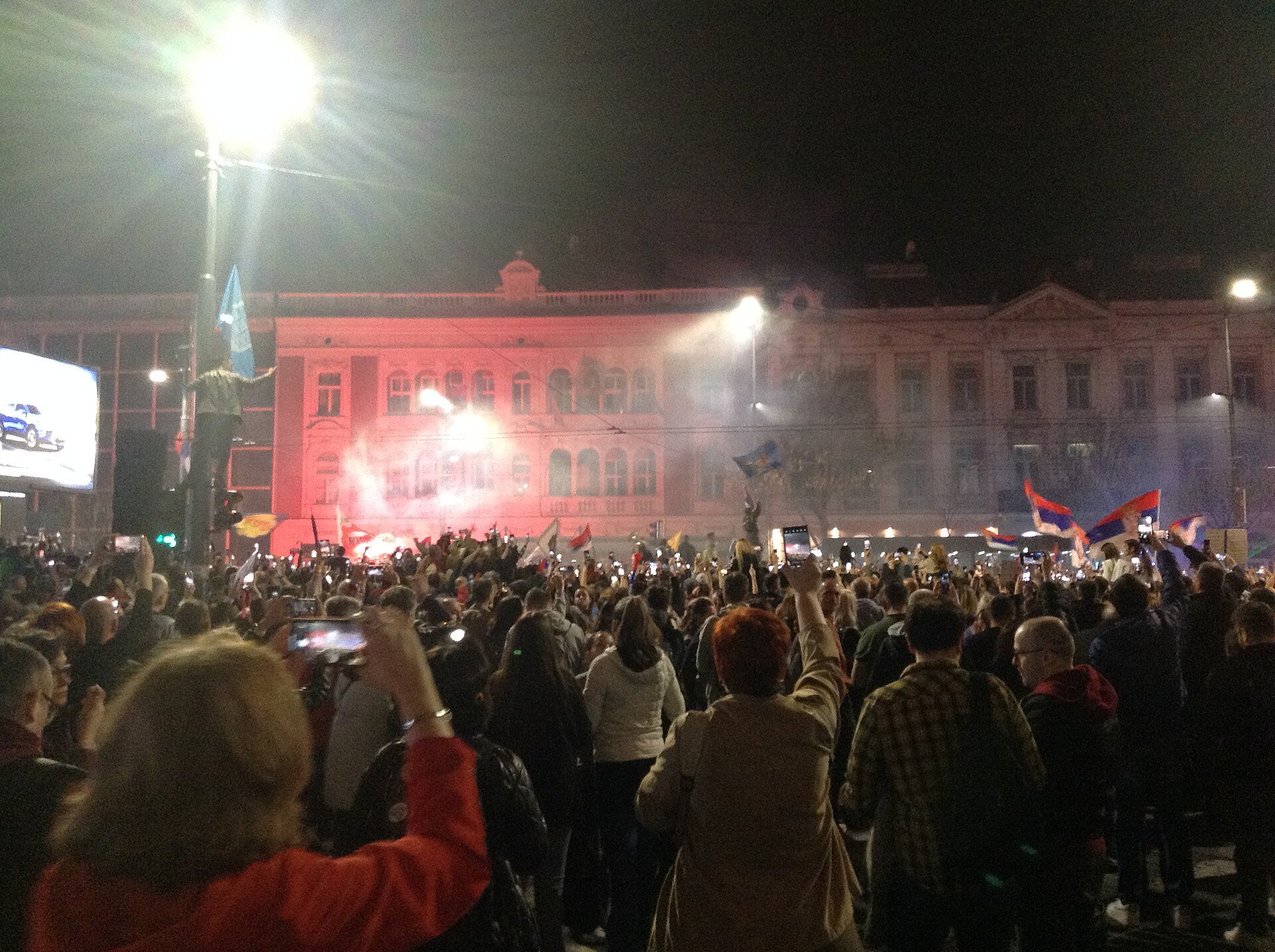 Crowds fill a Belgrade street on the eve of a student-led protest in Serbia