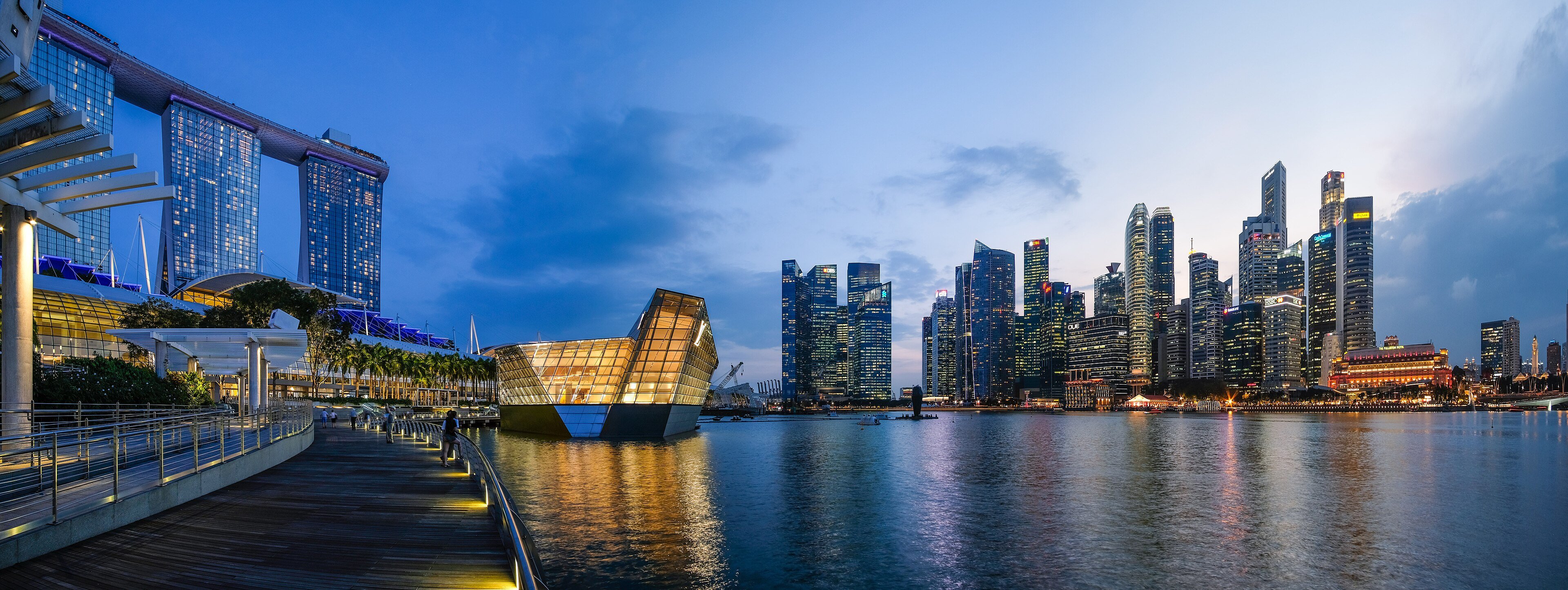 Singapore's Marina Bay at dusk, with the Marina Bay Sands hotel and the business district