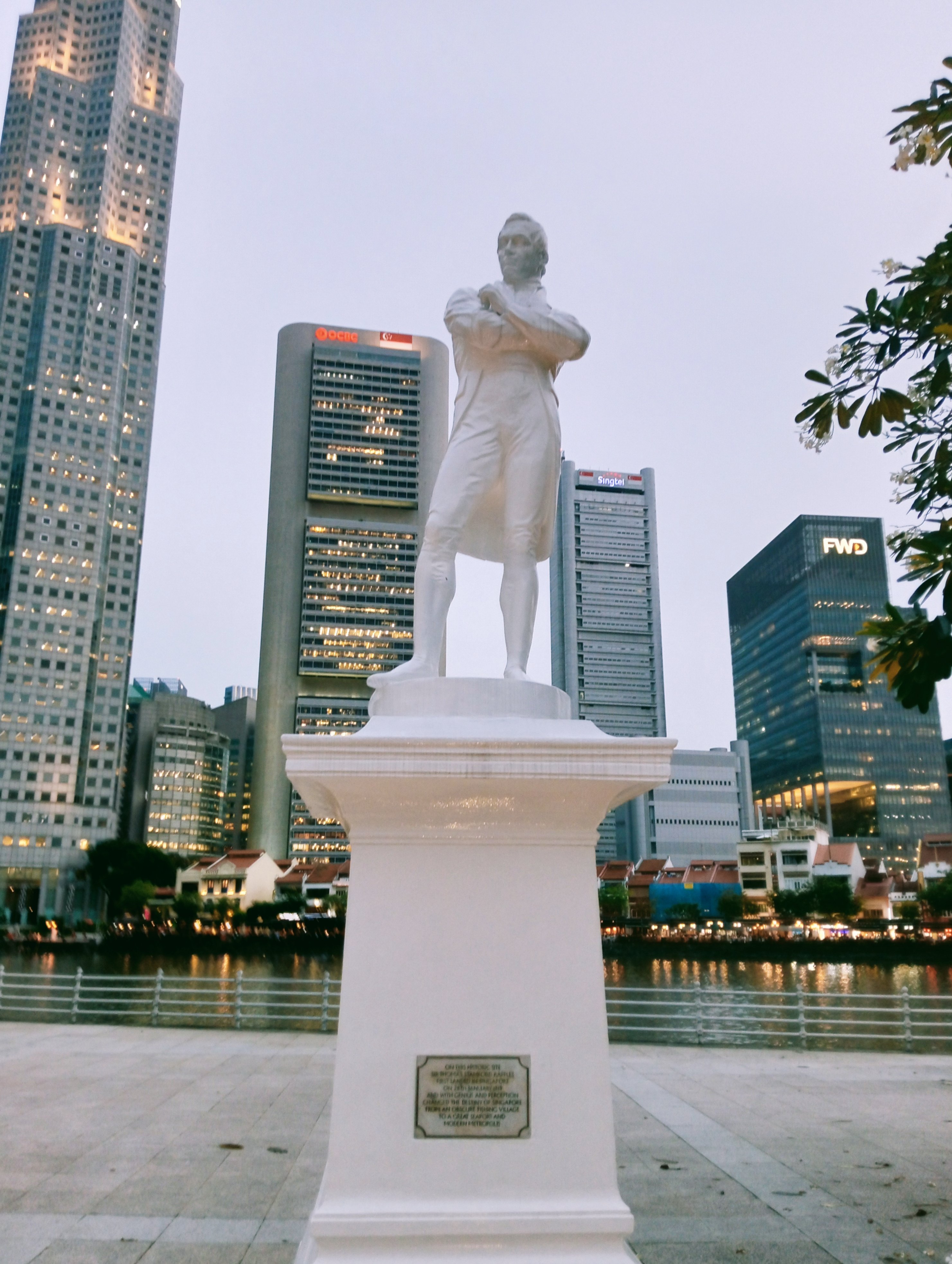 The statue of Sir Stamford Raffles beside the Singapore River