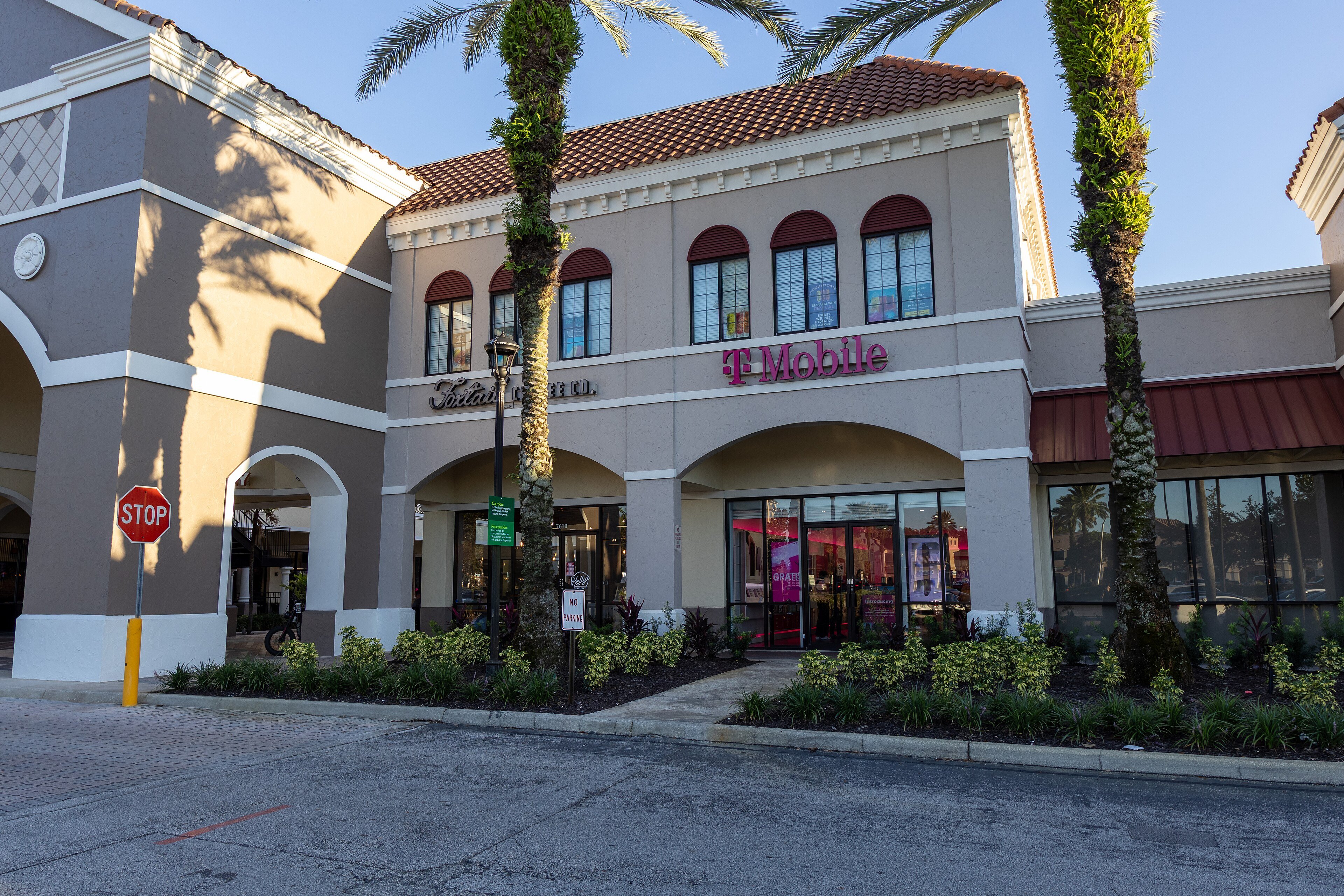 The front of a T-Mobile store with its magenta sign at a shopping centre in Orlando, Florida