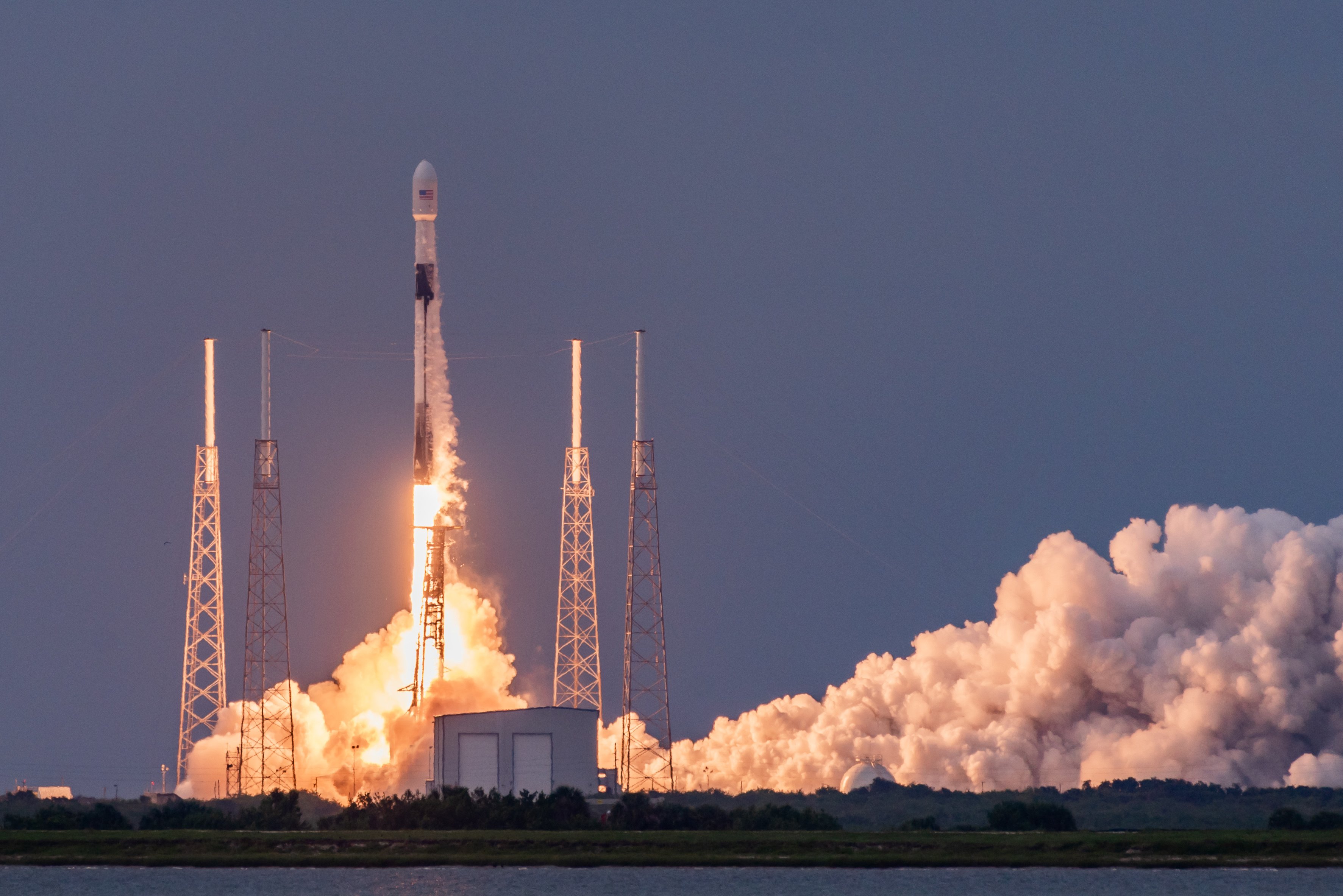 A SpaceX Falcon 9 rocket lifting off from Cape Canaveral in Florida