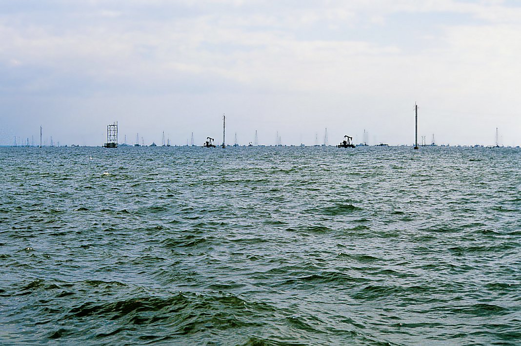 Oil pumps and drilling towers standing in the water of Lake Maracaibo in western Venezuela