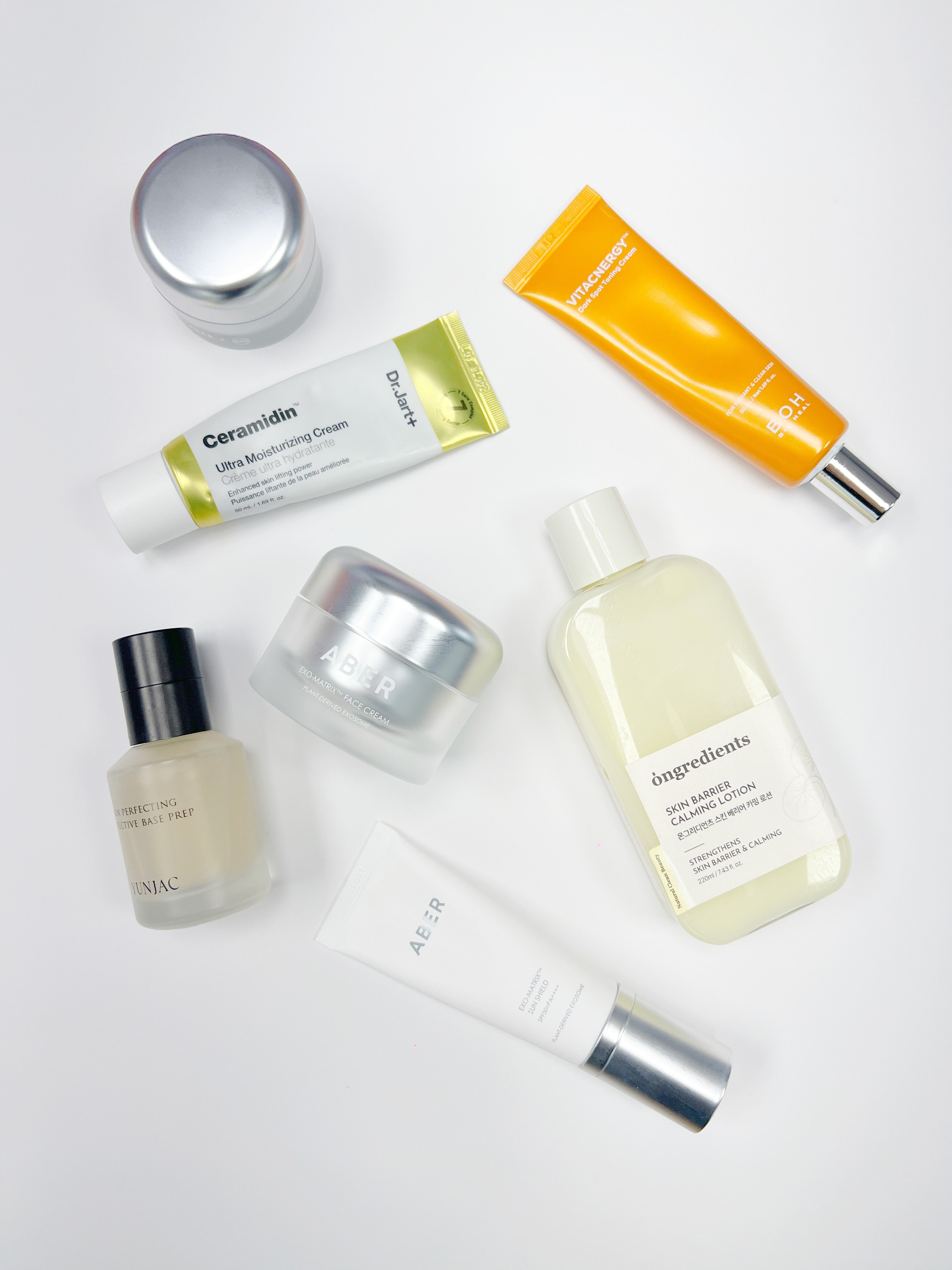 Skincare and cosmetic products lined up on a shop shelf