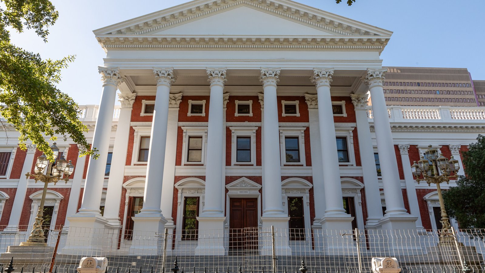 The columns of the Parliament of South Africa in Cape Town under a clear sky